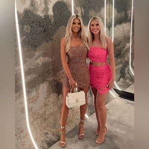 Worn once. Few beads missing in the front. But not noticeable